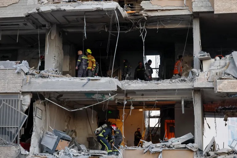 Israel pounds Lebanon, targets residential building in central Beirut

